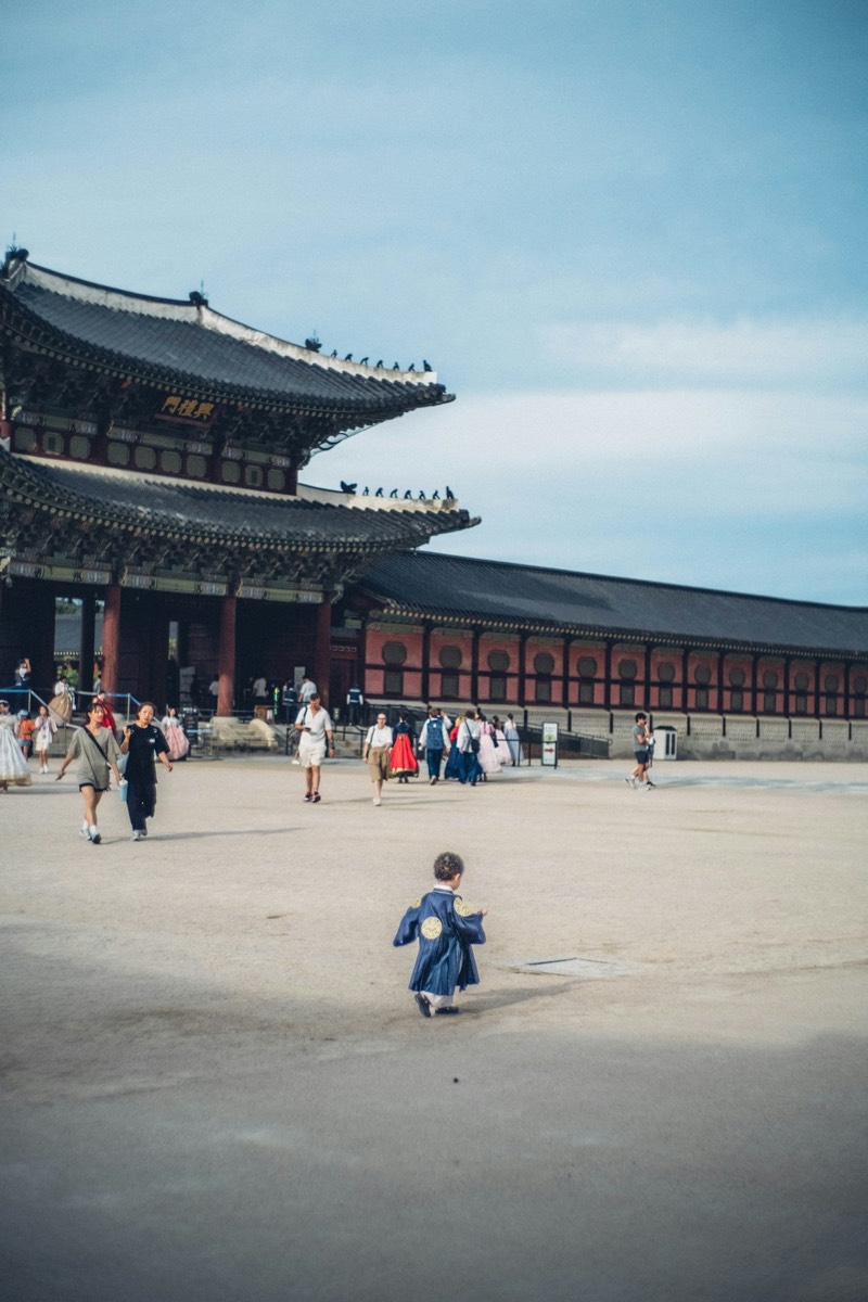 Children wearing traditional hanbok at a Korean palace